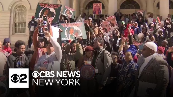 Migrants Rally At City Hall For Better Quality Of Life