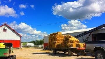 (Time-lapse) Unloading Hay/Straw Square Bales