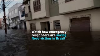 Watch how emergency responders are saving flood victims in Brazil