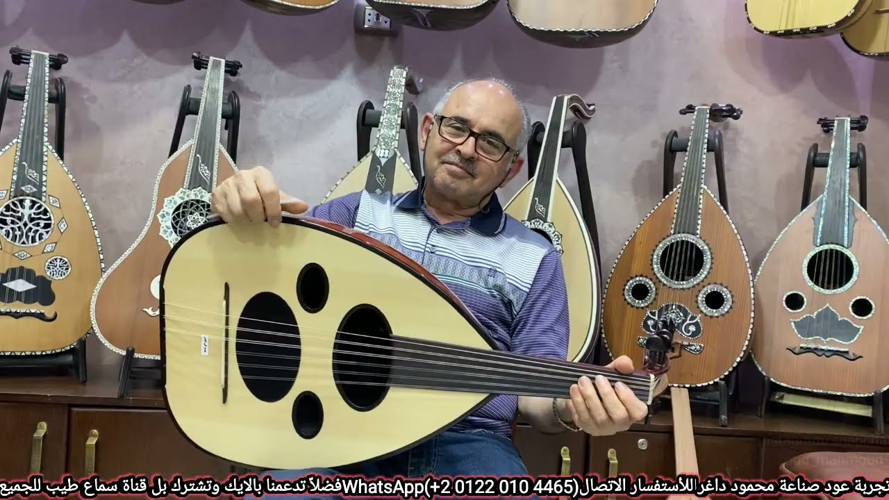 رد فعل الموسيقار خالد محمد علي على اعواد محمود داغر اثناء زيارته للمعرض بالقاهرة