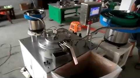 Automatic actuator spray nozzle assembly machine