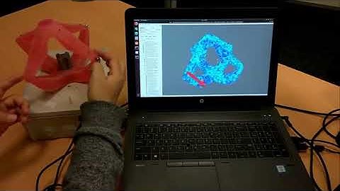 Vision Based Sensing of External Forces Acting on Soft Robots Using Finite Element Method