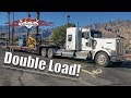 Double load On The Landoll | Skidsteer and Scissor Lift