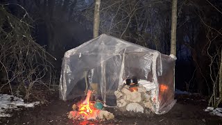 Bushcraft Camp in a Cozy Warm Survival Shelter in the Woods with Outdoor Cooking