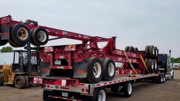 Stacking Container Chassis On A Step Deck Trailer / Four Container Chassis Stacked