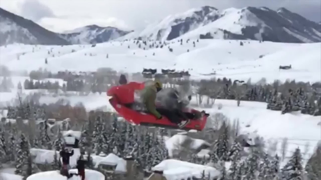 Friends ride inflatable kayak down ski slope - YouTube