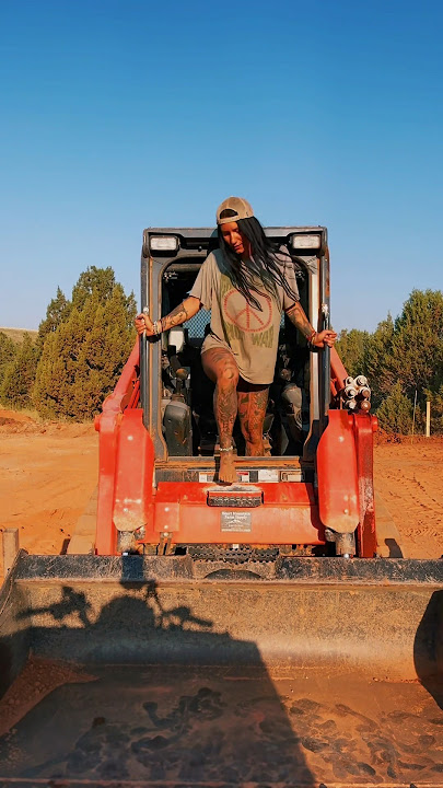 Time to get to work. You coming?? 🤠 #skidsteer #countrygirl #tattooedlife #country #barefooting