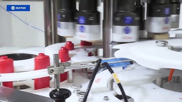 Huituo full automatic cap pressing machine, capping machine for shampoo, body lotion.