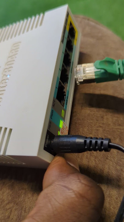 Plug in a cable on the router Mikrotik RB 951 #router #mikrotik #routerboard #Rb951