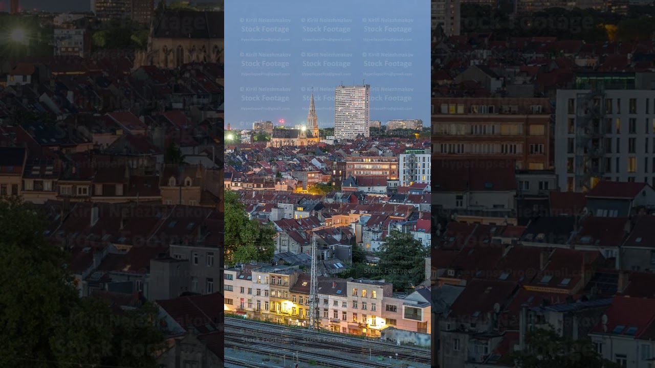 Aerial day to night timelapse panorama over Brussels skyline in Schaerbeek with Saint-Servais Church