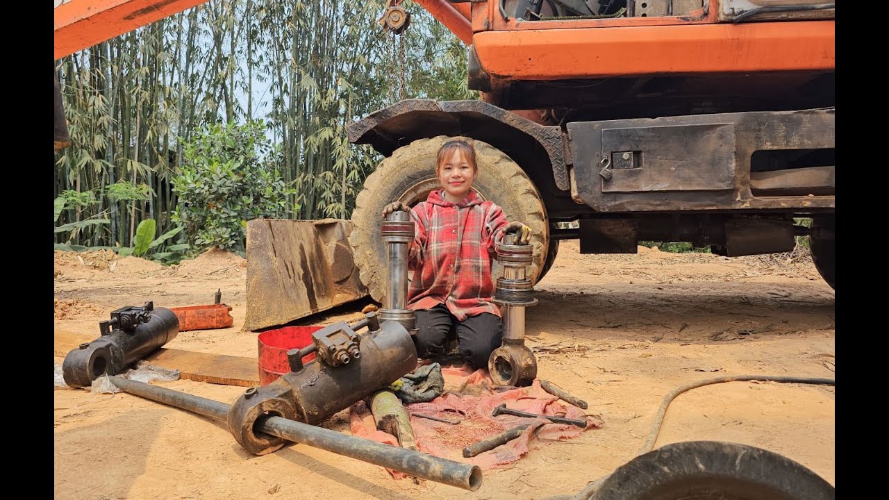 Talented girl replaces badly scratched excavator hydraulic system