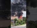 Nearby roads blocked as crews fight Midvale house fire burning in attic, backyard