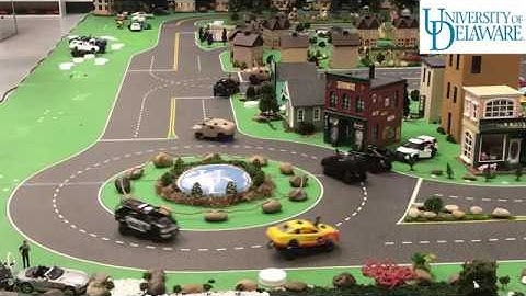 Optimal Coordination of Vehicles in a Multi-Lane Roundabout