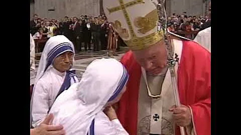 St. John Paul II greeted and blessed St. Teresa of...