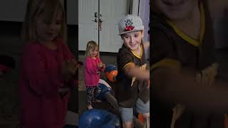 Kiddos on Christmas 2023. Pugil stick and silly string fights!! Missing Calyssa and Braelyn..