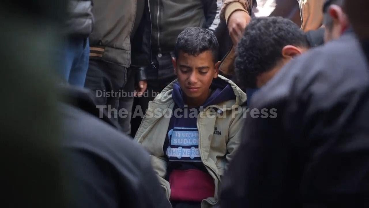 Funerals held in Khan Younis, Gaza after police officers killed in overnight Israeli strikes