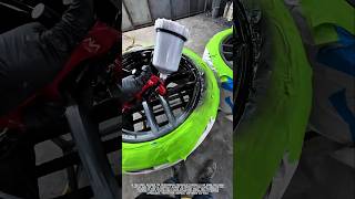 Professional Wheel Rim Painting Process with Spray Gun.