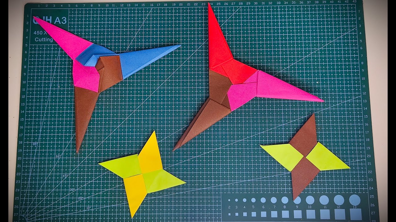 Origami. A superstar. Threepointed and fourpointed battle star made