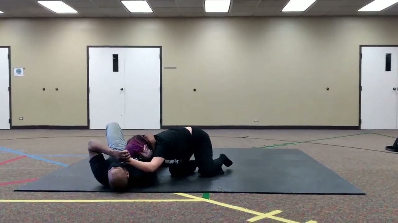 Single Arm Choke Defense (Attacker Is In Rear Top Mount Position)
