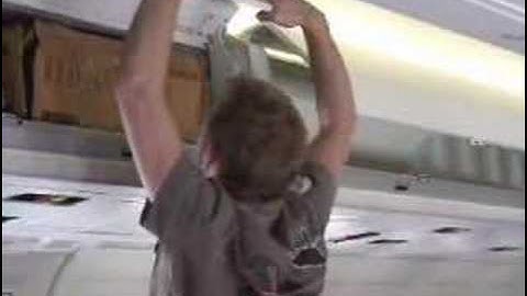 Overhead bin won't close