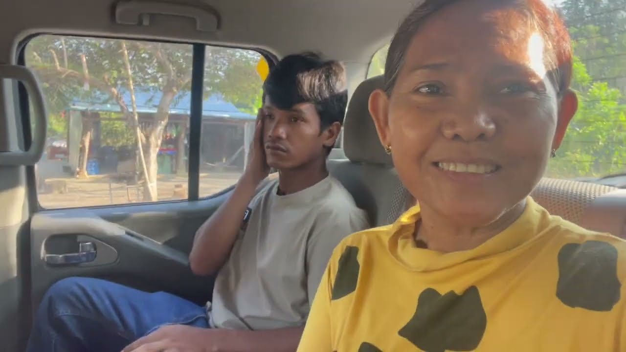Picking up some new plants for the garden at the Battambang nursery