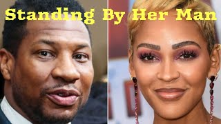 Meagan Good Standing by Jonathan Majors. Accompanies him at his court appearance. Just the Two of US