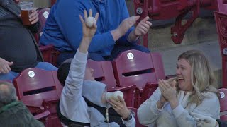 Dad snags foul ball while feeding baby