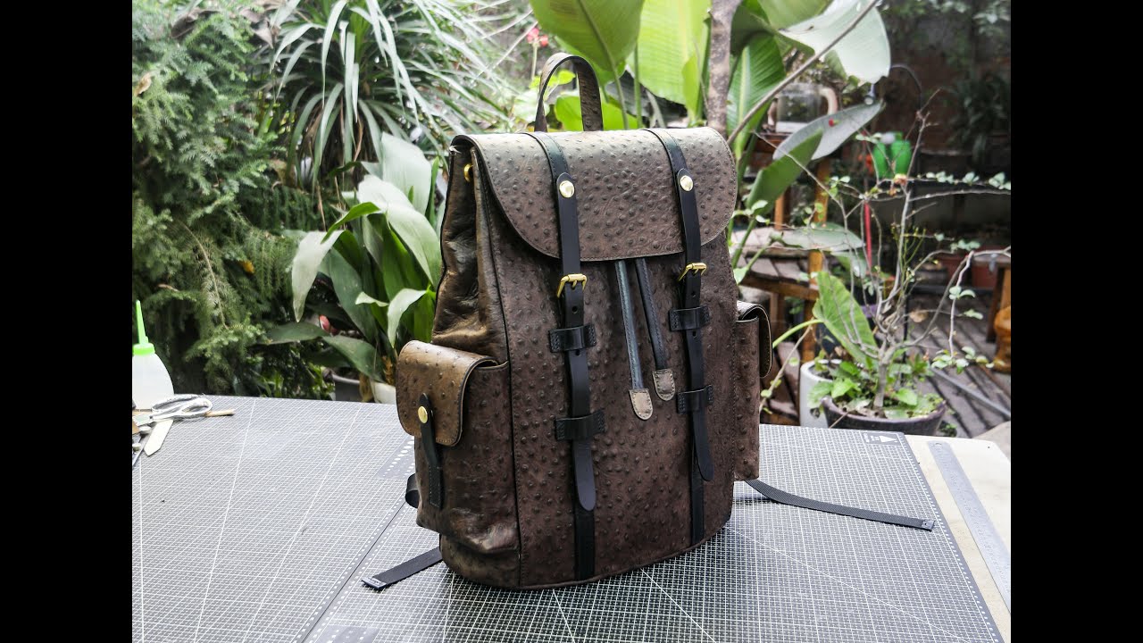 Create an ostrich patterned cowhide backpack
