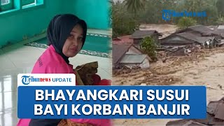 Sosok Bhayangkari Yang Rela Menyusui Bayi Korban Longsor Yang Nangis Karena Terpisah Dengan Ibu