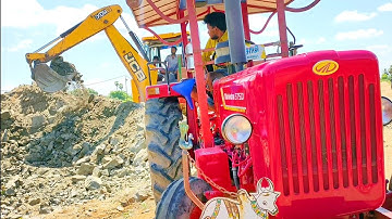 Mahindra tractor 575di soil load with JCB 3dx machine work stuck in mud