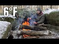 Deep woods solo winter camping in a primitive shelter