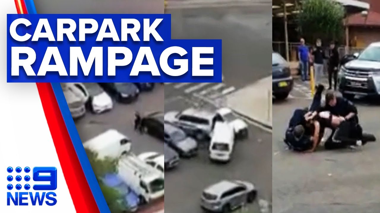 Police allegedly attacked as driver smashes into cars in carpark | 9 News Australia