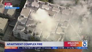 Fire crews battle apartment fire in Hollywood