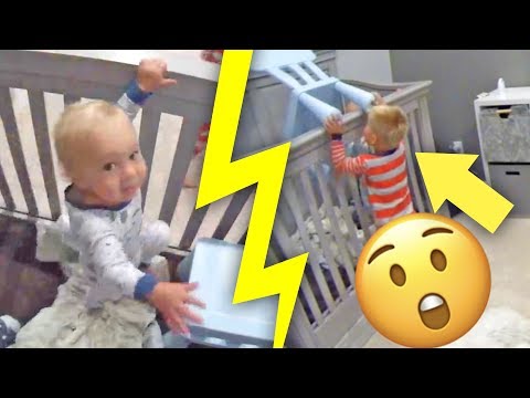 CAUGHT ON CAMERA! - Toddler helps baby escape from crib!