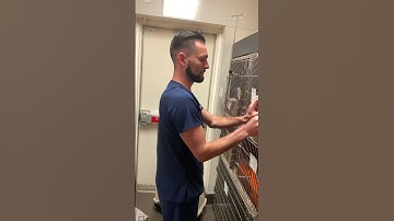 Skill 9. Video of placing a cat in an upper cage.