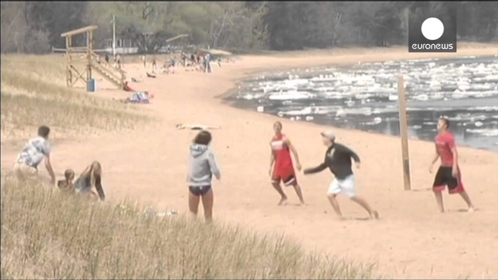 An ice day for a swim: Lake Superior icy cold in spite of warm weather