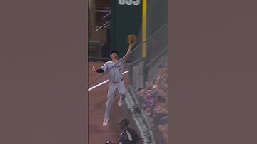 Tyrone Taylor makes an INCREDIBLE leaping catch into the netting!! 🤯🤯 #baseball #clips #shorts