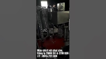 Máy chiết rót và đóng nắp chai tự động