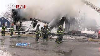 Fire destroys Quincy building, weather hinders firefighters