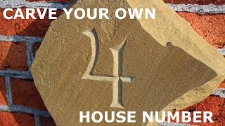 Hand carved stone house number