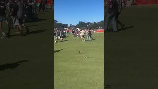 Snake Slithers Past Spectators During Golf Tournament
