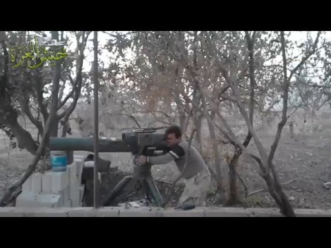 شاهد الثوار يدمرون رشاشين عيار 14 5 على حاجز زلين وحاجز الزلاقيات في ريف حماة 13 12 2015