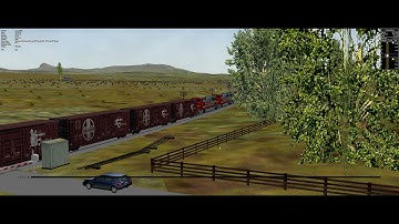 ATSF 837 leads mixed freight across Cajon pass clip 2. [Open Rails]