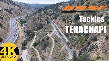 BNSF Freight Train Climbs Thru Steep Canyon - Tehachapi Pass - 4K HD Drone Footage