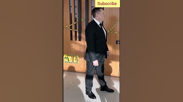 Elon Musk is walking around in a black suit #ai #trump #putin #technology