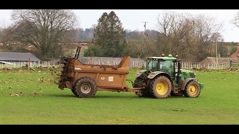 Loading and Spreading Fodder Beet for Sheep.   John Deere action.