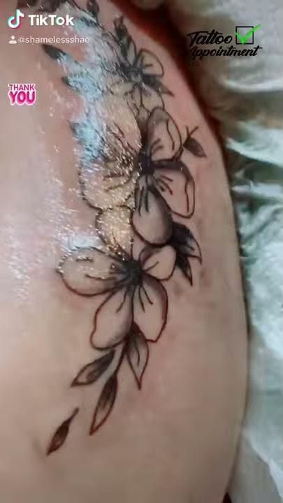 Flower hip tattoo | Tattoo Journey