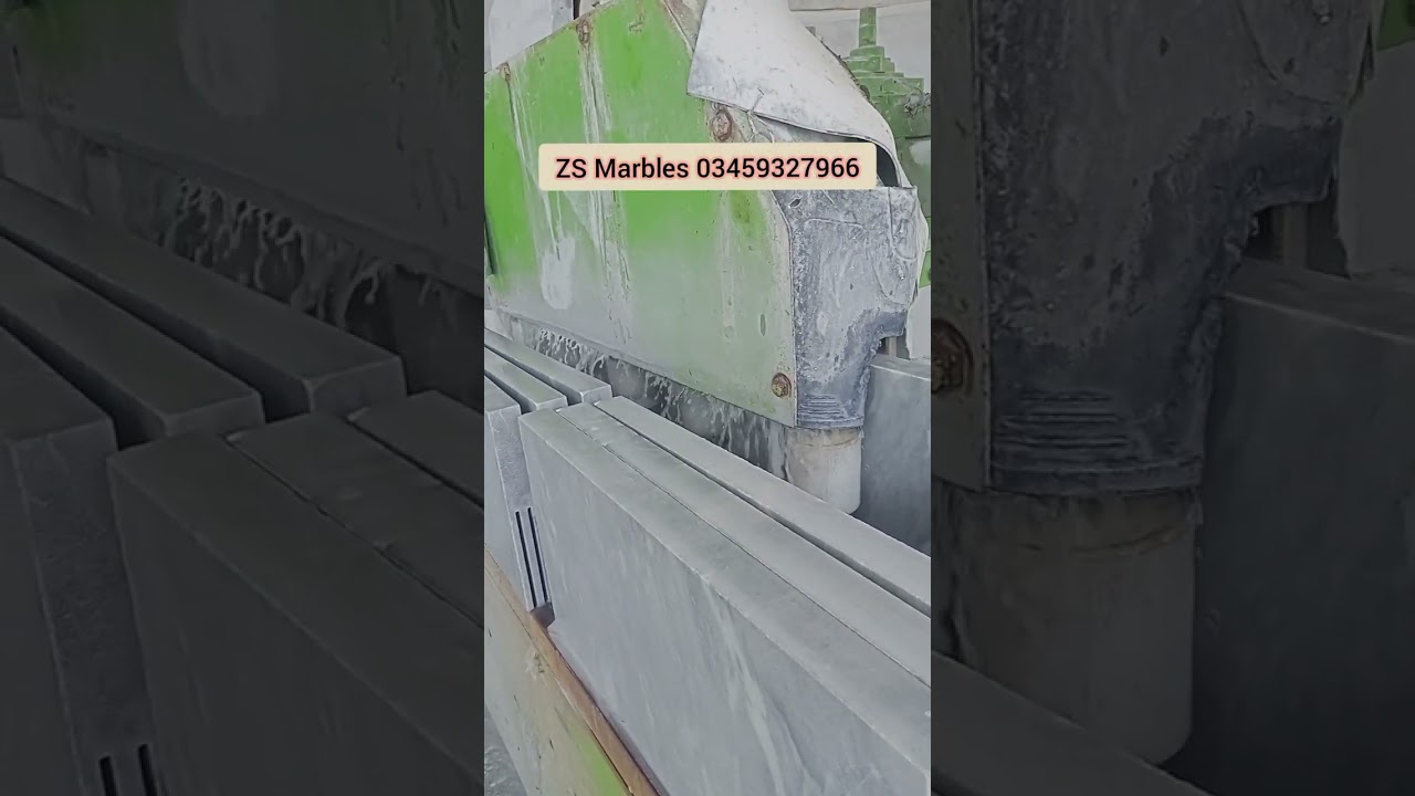 marble tiles making process using heavy machinery.