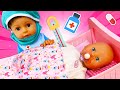Baby Annabell doll is crying! The baby doll caught a cold. Baby born doll feeding with food &amp; care.
