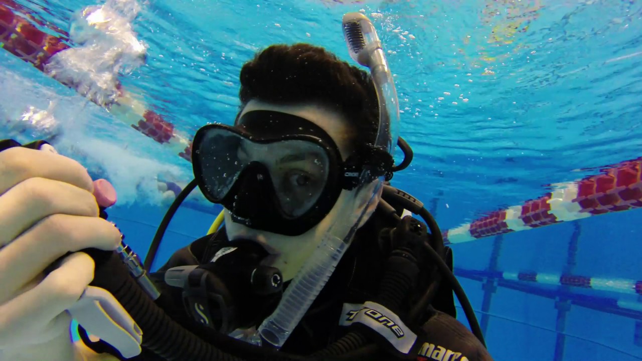 Scuba diving first lesson in the pool YouTube